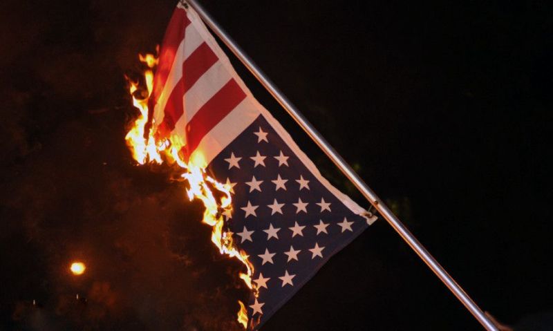 Trump Flag-Burning EO Triggers Immediate Protest and Arrest Outside White House